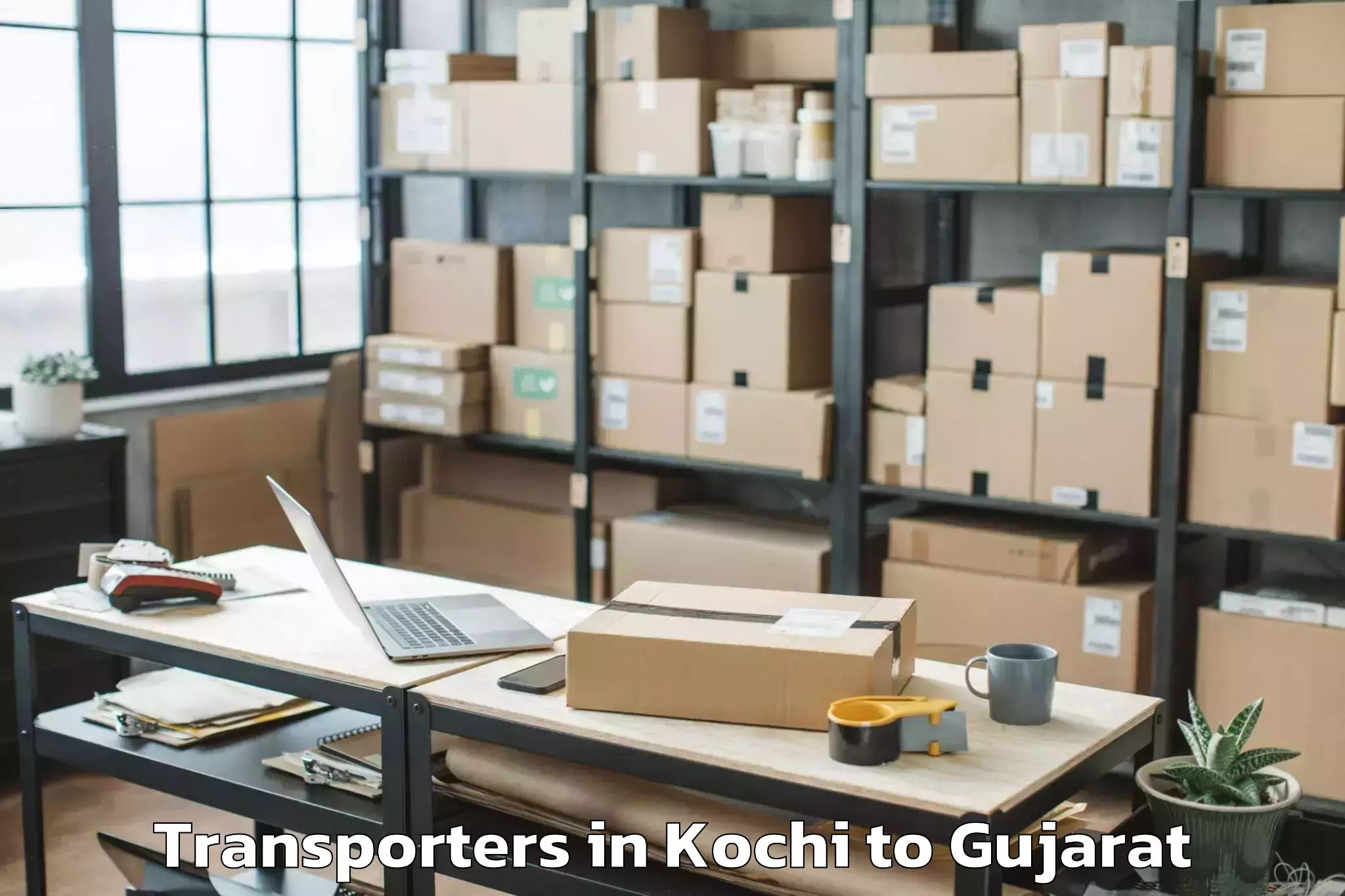 Top Kochi to Shehera Transporters Available